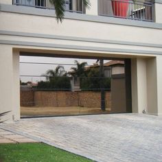 an open garage door on the side of a building