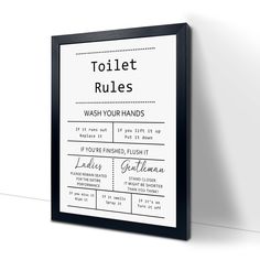 a bathroom rules poster hanging on the wall