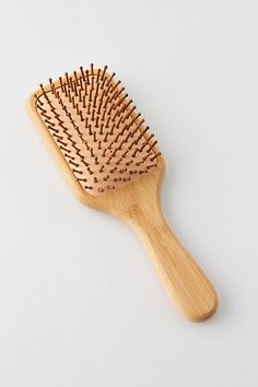 Designed to glide through your hair smoothly, while teasing natural oils along each strand, this Emi Jay brush helps give your hair a nourished and shiny look and feel. Features Paddle brush from Emi Jay Ventilation hole to aid in drainage after the brush has been washed Content + Care Organic bamboo wood handle, bristles, bio-acetate back Imported Size Dimensions: 9.8" l x 3.3" w | Emi Jay Bamboo Paddle Brush in Pink at Urban Outfitters Emi Jay, Bamboo Brush, Paddle Brush, Brand Sale, Hair A, Hair Brush, Wood Handle, Art Project, Natural Oils