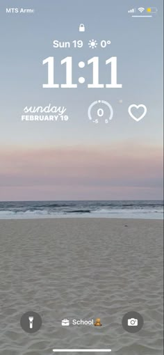 an iphone screen showing the date and time for this day on the beach with waves in the background