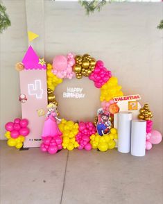 a birthday party with balloons and decorations