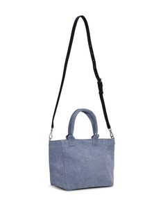 Find GANNI Embroidered Logo Tote Bag on Editorialist. This GANNI tote bag features a logo embroidered to the front, a slogan print to the front, an adjustable and detachable shoulder strap, and two top handles. It also features a main compartment. The bag is made from a conscious material. This item comes from a brand rated three out of five ('It's A Start') by Good on You at the time it was added on FARFETCH. This is a brand-level rating and does not guarantee that this product is made with con Cotton Tote Bag With Detachable Handle, Blue Cotton Bags With Leather Handles, Cotton Top Handle Bag With Removable Pouch, Casual Blue Top Handle Bucket Bag, Casual Blue Top Handle Bag, Blue Rectangular Canvas Bag For On-the-go, Cotton Top Handle Bag For Daily Use, Cotton Satchel With Double Handle, Cotton Shoulder Bag With Removable Pouch And Top Handle