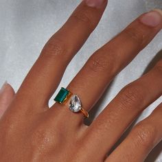 Meet your new favorite statement piece: our Toi et Moi Ring, showcasing a stunning duo of green onyx and white topaz. This chic, 14k gold-plated sterling silver ring is more than just a piece of jewelry - it's a symbol of unity and balance. The perfect blend of timeless elegance and modern style, it's sure to turn heads wherever you go.   The band is made of 14k gold over sterling silver.  Hypoallergenic, nickel and lead-free. Tarnish resistant. H2o sensitive. Recommend taking it off during a shower or workout and storing it in the pouch that comes with the package. September Birthstone Jewelry, August Birthstone Jewelry, July Birthstone Jewelry, Zodiac Jewelry, Gifts For New Mums, Jewelry Ring Box, Pearl Jewellery Earrings, Men's Jewelry Rings, Topaz Stone