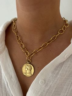 Antiqued gold coin necklace, 17in Gold-tone Medallion Necklace With Coin Pendant, Gold-tone Medallion Coin Necklace, Gold-tone Round Medallion Necklace With Coin Pendant, Vintage Yellow Gold Coin Necklace With Adjustable Chain, Yellow Gold Coin Necklace With Chain Detail, Yellow Gold Coin Necklace With Chain, Elegant Gold-tone Coin Necklace, Vintage Gold-tone Chain Necklace With Coin Pendant, Vintage Gold-tone Coin Necklace