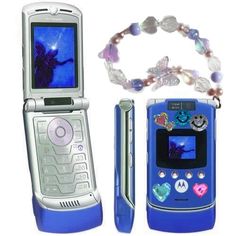 there is a cell phone with beads on it and a lanyard next to it