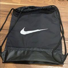 Nike Drawstring Bag In Great Condition! Looks Brand New! Casual Black Gym Bag, Black Drawstring Travel Bag, Nike Casual Black Backpack, Sporty Drawstring Bag For Everyday Use, Black Casual Nike Backpack, Casual Black Nike Backpack, Black Drawstring Gym Bag, Black Drawstring Gym Backpack, Casual Black Gym Bag With Drawstring