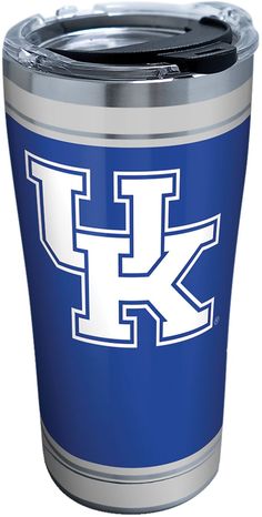 the university of kentucky logo is shown on a blue and silver tumbler cup,