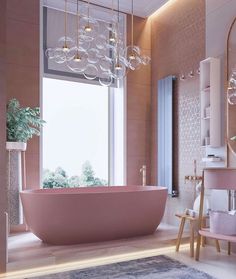 a bathroom with a pink bathtub and chandelier hanging from the ceiling next to a large window