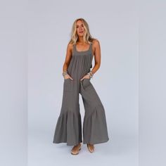 Elevate Your Boho Wardrobe With This Beautiful And Versatile Jumpsuit, The Sienna Wide Leg Ruffle Jumpsuit! It Will Keep You Looking Fabulous And Feeling Comfortable All Day Long Because It Features: Comfortable, Lightweight, Textured,Premium Poly Blend Gauze Fabric Relaxed And Loose Silhouette Flattering Straight Neckline With Thick Shoulders Straps Convenient Front Patch Pockets For Your Essentials Open Back With Cute Adjustable, Self-Tie Strap Detail Gathered Details Along The Wide Legs And N Boho Wardrobe, Jumpsuit Plus Size, Black Scrubs, Ruffle Jumpsuit, Bow Detail Dress, Gauze Fabric, Scrub Pants, Wide Legs, Fitted Skirt