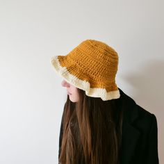 Crochet Mustard Egg Bucket Hat Handmade Knitwear Accessory Yellow Cream White Knit  Crochet Mustard Egg hat 🍳🧶 Handmade, Strachable, and Fun! One of My sustainable and thrift yarn pieces! Handmade by: Morgana Bird Thrifted yarn: Acrylic Care: 30C hand wash Measurements Lying flat: Width: 25 cm Length: 21 cm For any questions please message me! I will gladly help! Egg Hat, Handmade Knitwear, Crochet Bucket Hat, Hat Handmade, Yellow Cream, Crochet Yarn, Cream White, Knit Crochet, Caps Hats