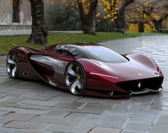 a red sports car is parked on the street