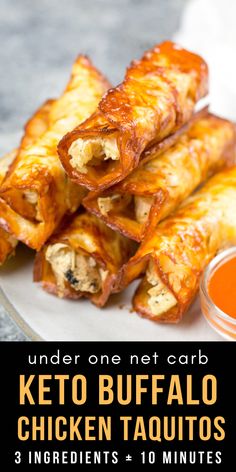 chicken and cheese spring rolls on a plate with dipping sauce