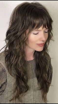 Discover the edgy Long Shag Mullet hairstyle that is making a comeback in 2024! This versatile haircut combines long layers with a shaggy texture for a bold and trendy look. Pair it with some chic Shag Haircuts for a modern twist on a classic style. #LongShagMullet #ChicShagHaircuts #HairTrends #HairstyleInspo Long Shag Thick Hair, Shag Hairstyles Long With Bangs, 70s Shaggy Hair Long, Shaggy Haircut Bangs, Whimsigoth Haircut, Long Shaggy Haircuts With Bangs, Long Female Mullet, Shag Hairstyle Long, Long Shag Mullet Haircut