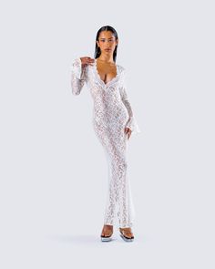 The type of dress that will have them thinking about you forever ☁️ give them something to remember in this white lace maxi dress. Complete with a deep V neckline, long sleeves, a mermaid skirt, and a ruffled sleeve hem 🕊️ Leave little to the imagination -- 'dress' is sheer & undergarments are not included 👀 White Maxi Dress With Scalloped Lace V-neck, V-neck Maxi Dress With Scalloped Lace For Party, Party V-neck Maxi Dress With Lace Sleeves, V-neck Maxi Dress With Lace Sleeves For Party, Long Sleeve Maxi Dress With Scalloped Lace For Parties, Long Sleeve Scalloped Lace Maxi Dress For Party, Fitted White Maxi Dress With Lace Sleeves, White Fitted Maxi Dress With Lace Sleeves, White Maxi Dress With Scalloped Lace For Evening