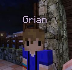 a man standing in front of a stone wall with the word omen on it