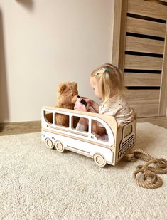 This custom bus-shaped storage for kids' toys is the perfect blend of functionality and charm, making it an ideal addition to any boho nursery or playroom decor. Crafted as a wooden toy organizer, it offers ample space for your little ones' treasures while adding a personalized touch to their environment. This delightful and unique piece not only keeps toys neatly organized but also enhances the playful and whimsical atmosphere of the room, making clean-up time a fun and engaging experience for Storage For Kids Toys, Personalized Toy Box, Gift For Godson, Personalised Toy Box, Godson Gifts, Toy Organizer, Water Based Acrylic Paint, Kid Toy Storage, Nursery Storage