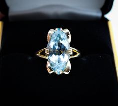 This is such a beautiful aquamarine 4CT marquise cut 14K gold ring, size 7. The color of the the stone is just breathtaking, the light blue color was hard to display but if you need more images please email me. The cut is cold to the touch, and very good quality. It is made from the 1960's-1970's. Vintage or Antique. This would make a stunning gift or engagement ring if you are into this style. Aquamarine Gold Ring, Aquamarine Gem, Spinel Ring, Pink Spinel, Star Of David Pendant, Alexandrite Ring, Etsy Gold Ring, Blue Band, 14k Gold Ring