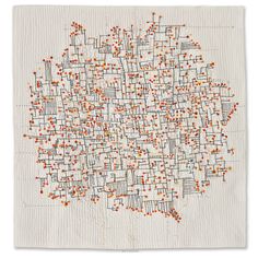 a piece of art with orange and white squares in the shape of a city map