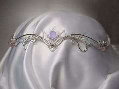 Average delivery terms USA, France, Ireland - 3-4 weeks Australia, Canada - 4-6 weeks Netherlands, Spain - 2-3 weeks Wire wrapped tiara made of silverplated copper wire and Czech glass beads. The piece is covered by metal protecting lacquer. The tiara fits any head size. It has two cords made of metallic embroidery floss on  it's sides and a slide bead to adjust the tiara to the size you need. Another metal (copper, brass) or beads are also possible if you prefer to make some changes to the desi Forehead Tiara, Wedding Circlet, Elven Wedding, Jewelry For Wedding, Rainbow Fairy, Fairy Crown, Metallic Embroidery, Headpiece Jewelry