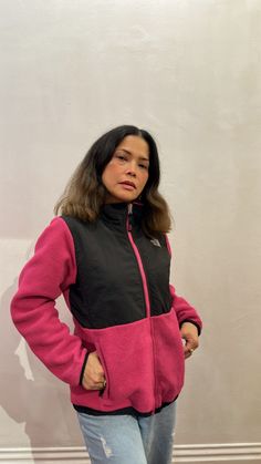 Vintage 90s The North Face fleece jacket in black nylon and hot pink fleece. Perfect for everyday wear or adventuring outdoors. -Zip up -Secure zip side pockets -Hem cinch cord  -Elastic cuffs -Hanging loops on neckline and sleeves -Signature The North Face logo embroidered on the back and front -Stand collar -Mid-weight -Standard fit -Size Tag Extra Large - 18 -Length | -Sleeve length | -Chest |  -Shoulders | The North Face Fleece Jacket, The North Face Fleece, North Face Fleece Jacket, Pink Fleece, Face Logo, North Face Fleece, Black Nylon, Black Nylons, Logo Embroidered