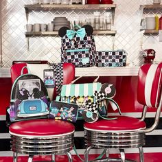 This backpack features an all-over black-and-white checkered pattern, reminiscent of a dance floor in a 1950s diner. Inside the white checkered boxes, you’ll find printed images of records, jukeboxes, Disney’s Mickey Mouse and Minnie Mouse, popcorn, and ice cream sundaes. Signature Mickey Mouse ears also pop up on top. Accents of teal, including a 3D bow, add a retro pop of color, and a front zipper compartment secures smaller items for your journey. Dimensions: 9”W x 10.5”H x 4.5”D Material: Ny Date Night Movies, 1950s Diner, Drive In Movie Theater, Mickey Mouse And Minnie Mouse, Mini Mochila, Drive In Theater, Jukeboxes, Drive In Movie, Mickey Mouse Ears