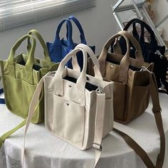 "This canvas bag/handbag tote bag/crossbody bag/birthday gift/casual bag/simple canvas bag/shoulder bag/large-capacity canvas bag，is perfect for daily. It can hold small items such as mobile phones, and cosmetics, laptop, notebooks Description Material: 100% Canvas Quantity: 1 Size : L*W *H : 9\"x5.9\"x 9.45\"( 23 x 15 x 24cm ) Colors: Multiple colors (optional) Function: handbag, shoulder bag, messenger bag If you have any questions, please feel free to contact me Thanks for visiting my store A Crossbody Canvas Shopping Bag With Pockets, Large Capacity Handheld Canvas Bag, Canvas Bucket Bag With Pockets For Shopping, Large Capacity Canvas Satchel For Daily Use, Handheld Canvas Bag With Pockets For Daily Use, Daily Use Handheld Canvas Bag With Pockets, Handheld Canvas Shopping Bag With Pockets, Trendy Handheld Canvas Bag, Trendy Square Canvas Bag For Daily Use