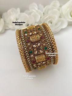 Extra wide very elegant Handcrafted Gold Plated Openable Screw Kada ( Single Pc) /High Quality Openable Kada/Gold Plated Polki bangles /South Indian Openable bangles/Classic Bangles/ designer Bangles  width approx 4.5cm  All items are shipped from Brampton, Ontario, Canada. If you need your item by a certain day, please reach out to us for express delivery option before placing the order so that we can update the shipping for you. Standard shipping/delivery timeline Below are the delivery timeline estimates. We dispatch all orders by the next business day. ---> USA delivery timeline * 2-6 business days to major urban centers in USA. It may take 1-2 days extra to remote locations ---> Canada delivery timeline  * 2-3 business days - GTA  & Montreal  * 2-4  business days - Rest of Ontario/Que Fusion Style Openable Bangle For Wedding, Elegant Multicolor Cuff Bracelet For Festive Occasions, Elegant Multicolor Openable Bangle, Multicolor Cuff Bracelet For Weddings, Fusion Style Cuff Bangle Bracelet For Festivals, Handmade Traditional Cuff Bracelet For Wedding, Multicolor Openable Bracelets For Wedding, Heavy Fusion Bangle For Festivals, Traditional Handmade Cuff Bracelet For Wedding