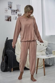 Keep your loungewear casual-cool with this sweatshirt and joggers set featuring a comfortable stretch-infused fit. Includes sweatshirt and matching joggers (two pieces total) Size Guide: Talita s 5’6” tall, and has a 33” bust, 24” waist, & 35” hips. She is wearing a S / US 4 / AU 8. This loungewear set is true to size. Sweatshirt (size S): 29" long from high point of shoulder to hem Joggers (size S): 27" inseam Material: 100% polyester Care Instructions: Machine wash / Cold hand wash Pink Crewneck Sweatshirt, Joggers Set, Blue Crewneck, Grey Crewneck, Pink Crewneck, Loungewear Set, Lounge Set, Lounge Sets, Size Pattern