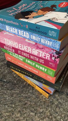 a stack of books sitting on top of a table