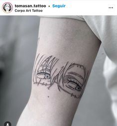 a woman's arm with tattoos on it