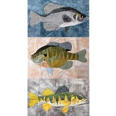 three fish are shown on the same piece of fabric, each with different colors and sizes