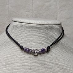 Amethyst Crystal Beaded Spiral Charm Adjustable Black Rope Necklace Comes On An Adjustable Waxed Black Cord Necklace. Necklace Is Adjustable From Approximately 13" To 22". Adjustable Purple Choker With Round Beads, Adjustable Beaded Purple Choker, Adjustable Lavender Beaded Necklaces, Adjustable Purple Beaded Choker, Adjustable Amethyst Beaded Necklaces For Meditation, Adjustable Lavender Crystal Necklace With Gemstone Beads, Adjustable Lavender Beaded Necklace With Natural Stones, Adjustable Amethyst Beaded Necklace In Lavender, Handmade Purple Spiral Jewelry