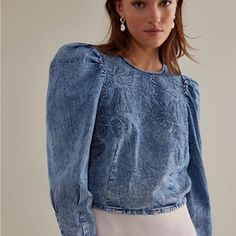 Questions? Leave A Comment Below! Chic Washed Denim Top For Fall, Fitted Denim Top With Puff Sleeves, Chic Washed Denim Top In Denim Blue, Chic Washed Denim Tops, Chic Washed Denim Blue Top, Chic Washed Tops For Fall, Medium Wash Cotton Puff Sleeve Top, Medium Wash Puff Sleeve Top For Spring, Fitted Denim Blue Puff Sleeve Top