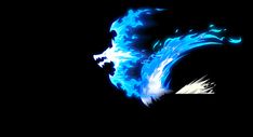 a blue and white fire bird flying through the dark sky with it's wings spread out