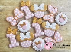 decorated cookies are arranged in the shape of letters and numbers for first birthdays or baby showers