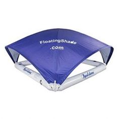 the floating shade tent is blue and has white trimmings on it's sides