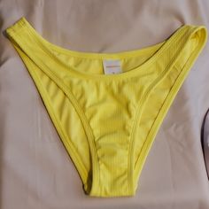 Modern Fit. Hip Contouring Bottoms. High Thigh Nwot Trendy Seamless Bottoms For Beach Season, Spring Yellow Seamless Bottoms, Trendy Fitted Swimwear Brief, Trendy Fitted Brief Swimwear, Trendy Fitted Swim Briefs, Seamless Yellow Bottoms For Summer, Yellow Seamless Bottoms For Summer, Yellow Stretch Tankini, Trendy Brief Swimwear For Beach Season