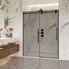 a bathroom with marble walls and flooring