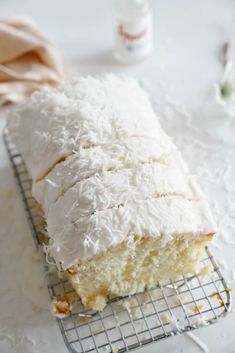 a piece of cake sitting on top of a cooling rack