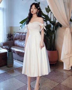 White evening dress,cute party dress,satin homecoming dress,simple midi dressMaterial:satinColor:as picture or custom colorStyle:cuteNeckline:off shoulderBack details:bandageDress type:A-line&ltp&gtFeatures:bowknot,simple&lt/p&gt&ltbr/&gt&ltp&gtThis dress could be custom made, there are no extra cost to do custom size and color.&lt/p&gt&ltbr/&gt&ltp&gt1, If the color is customized, please note the color & card number.&lt/p&gt&ltbr/&gt&ltp&gt2,You can choose standard size or custom size . If dres Knee-length Satin Dress For Wedding And Prom Season, Off-shoulder Satin Dress For Banquet, Summer Satin Strapless Dress For Banquet, Chic Midi Bridesmaid Dress For Prom, Wedding Strapless Midi Length Satin Dress, Wedding Satin Strapless Midi Dress, Wedding Midi Length Strapless Satin Dress, Off-shoulder Midi Dress For Wedding And Prom Season, Off-shoulder Satin Prom Dress For Spring