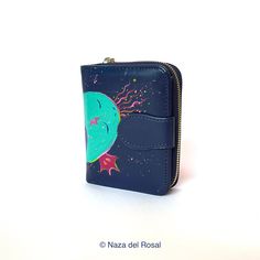 This leatherette wallet has been hand painted by Naza del Rosal. It has several compartments inside designed for you to organize all your bills, documentation, cards and coins in it. * Size: 12 x 10 x 3 cm. * Wallet materials: polyester * Colors may vary across different printers and monitors * Deliveries are made in high protective materials to ensure it reaches you in perfect condition For all other products, click here: https://www.etsy.com/shop/Nazadelrosal STAY IN TOUCH ☽ Website: www.nazad Blue Wallets With Interior Card Slots For Daily Use, Blue Rfid Blocking Coin Purse For Daily Use, Blue Coin Purse With Card Slots, Blue Coin Purse With Card Slots For Personal Use, Blue Card Holder With Card Slots, Blue Wallets With Card Slots For Daily Use, Blue Card Holder With Card Slots For Personal Use, Blue Wallet With Card Slots As Gift, Blue Bifold Coin Purse For Gift