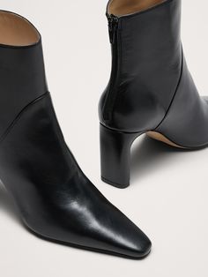 Look closely: these statement-making ankle boots have a distinctive heel shape—at once stiletto-like when viewed from the side, but wide enough to offer the comfort and stability of a wider, block heel.  We cut these from beautiful, Italian leather and added an extra layer of foam to the lining for comfort.  Italian leather uppers, leather lining, and rubber soles.  Premium foam cushioned footbed.  Back zip.  Made in Portugal.  B width.  Heel height: 3. 2" Modern Ankle-high Boots With Reinforced Heel, High Heel Boots With Branded Heel Counter For Fall, High Ankle Boots With Reinforced Heel For Work, High Ankle Work Boots With Reinforced Heel, Chic High Ankle Boots With Contrasting Heel, Fall High Heeled Boots With Branded Heel Counter, Workwear Boots With Reinforced Heel And High Ankle, Elegant Evening Heeled Boots With Reinforced Heel, Sleek Medium Width Ankle Boots