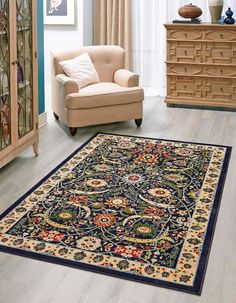 a living room with a chair and rug on the floor