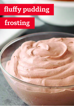 a bowl filled with frosting sitting on top of a counter