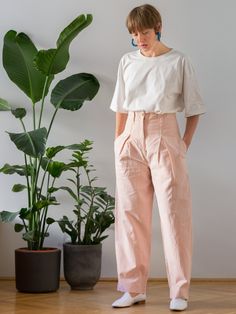 Buy 3 items and get 30% off your entire order. Limited offer. All orders are shipped via FedEx. Shipping to the US typically takes 2 to 3 business days, while within the EU, it takes 2 to 6 business days. These extremely cool vintage trousers are a must-have for any summer wardrobe. With an extra high waist and pleated front, they exude effortless sophistication. The side pockets and belt loops add both style and functionality. Crafted from a premium blend of linen and cotton, these pants are br High Waist Pleated Bottoms With Loosely Fitted Hips, High Waist Wide Leg Pants With Welt Pockets, High Waist Pleated Cotton Bottoms, Pleated High-waisted Cotton Pants, High-waisted Pleated Cotton Pants, High Waist Tapered Bottoms For Summer, Pleated High Waist Relaxed Fit Pants, High Waist Pleated Relaxed Fit Pants, Vintage Pleated Bottoms For Work