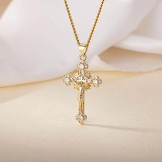 MATERIAL: Gold cross necklace for women, is made of stainless steel, with high quality 18K gold plated pendant and chain, lead-free and nickel-free, no irritation for sensitive skin LENGTH AND SIZE: Featuring a 16" chain with 2.4" extender, adjustable necklace suitable for most people. Cross pendant size: width 0.8", height 1.5" GOLD CROSS DESIGN: This gold necklace has a simple and dainty design. You can wear all the time to go with everything and fit for work, vocation, party, travel and any o Cross Pendant Necklace Woman Gold, Elegant Gold Cross Necklace For Gift, Gold Elegant Metal Cross Necklace, Elegant Gold Metal Cross Necklace, Gold Cross Pendant Necklace For Mother's Day, Gold-tone Cross Pendant Jewelry Gift, Gold Cross Necklace, Christian Jewelry, Cute Necklace