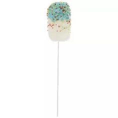 a white and blue lollipop with sprinkles on it's tip