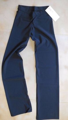 Brand new with original hangtags,  BalTogs 48422 Microfiber/Lycra V-Front straight leg black jazz pants. Baltogs size Extra Large Ladies but runs small so be sure to take your measurements and compare to the size chart.  Laid flat, the waist measures 12" and stretches to 15".  Inseam is  hemmed to 35".  These elegant looking pants are great for class, stage or streetwear. BT/bckbx We have tens of thousands of dance costume items, check out our other listings! We happily Trend Tops, Jazz Pants, Dance Costume, Dance Costumes, Dance Wear, Kylie Jenner, Short Pants, Extra Large, Straight Leg