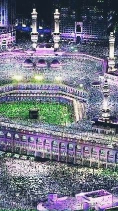 an aerial view of the grand mosque in makkah, saudi at night time