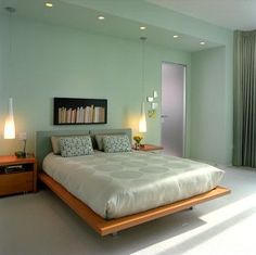 a bedroom with a large bed and two nightstands